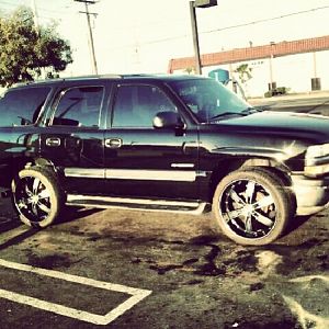 2003 Chevy Tahoe 24's, 4.8 liter 40 series Flowmaster, 3" exhaust from manifold, Very impressive sound system.... DA HOE