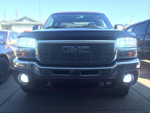 5000k 35W low beams and fog lights. 6000k 55W high beams and a relay from mr. taillight so I can have them all on at once! Putco shadow billet grille
